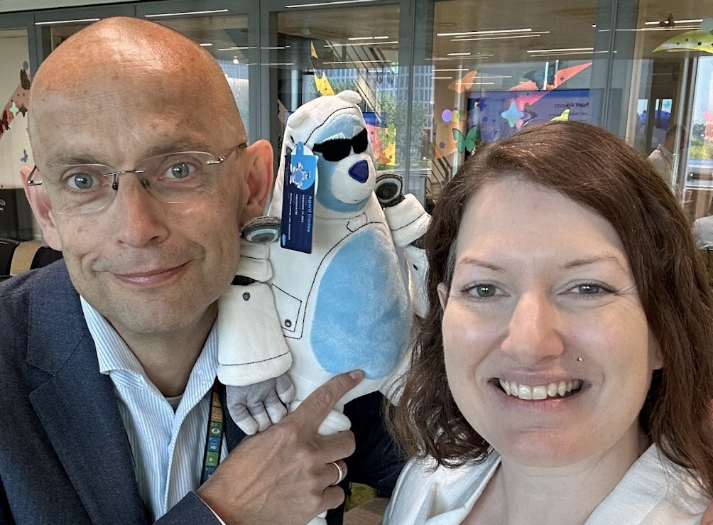 Ivar Jansen and Cori O’Brien kicking off Nonprofit Community Day with a new Agent Cody plushie! June 2025.