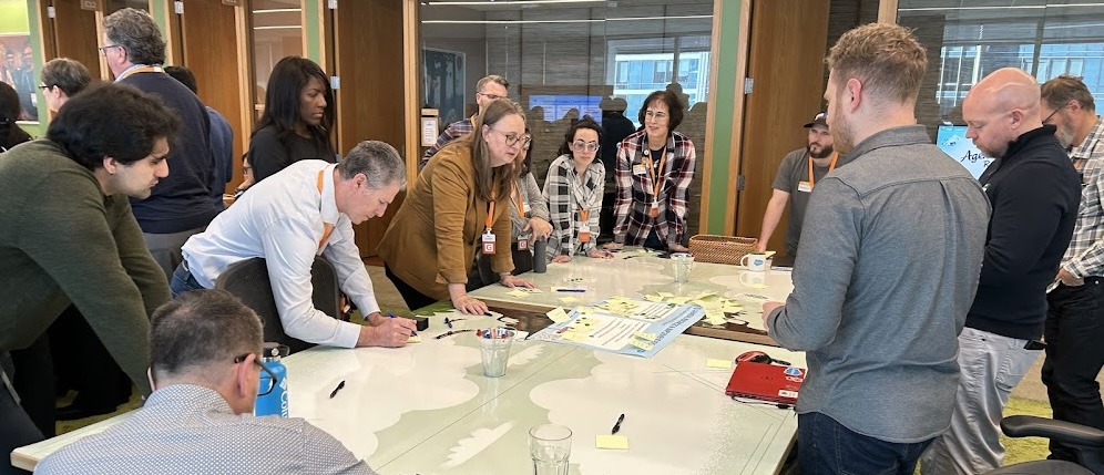 During the morning innovation session (stickies galore!), our Tech Mentors grouped challenges into Themes to organise potential projects, December 2025.
